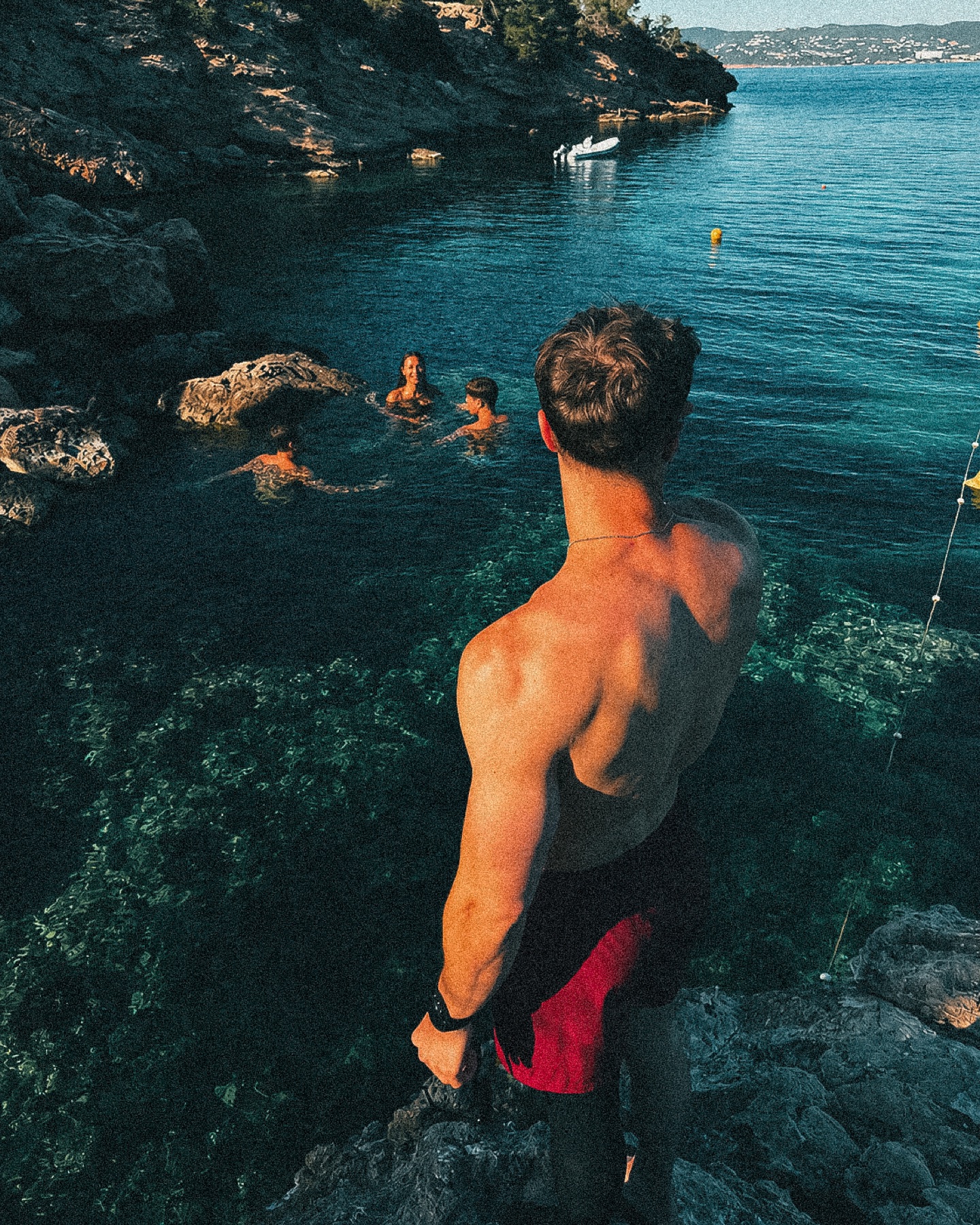 The group swimming in a cove